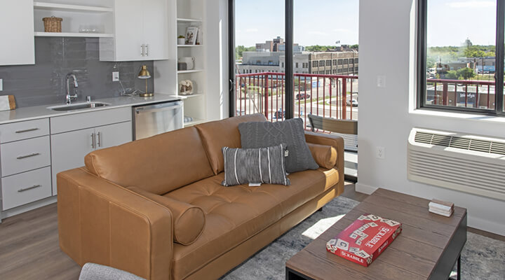 Everlake apartment workspace with desk, chair, and large window view