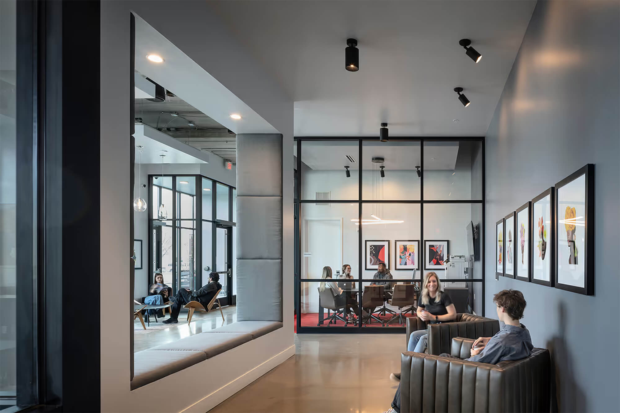 Fitness center with cardio machines, free weights, and mirrored wall
